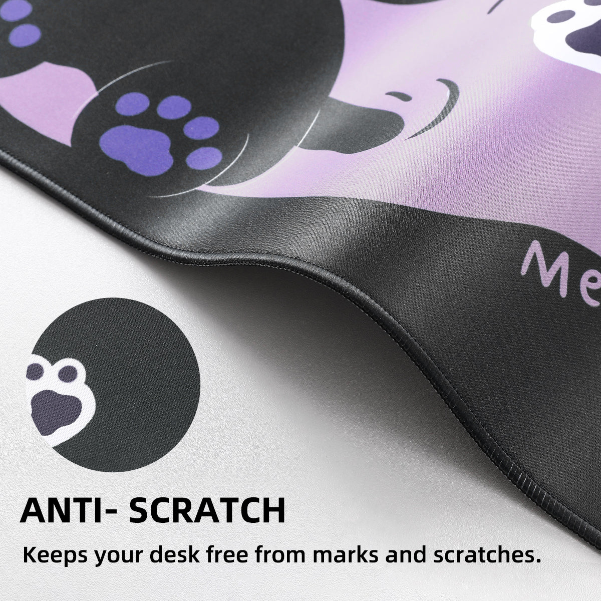 Close-up of the desk mat's stitched edge and surface