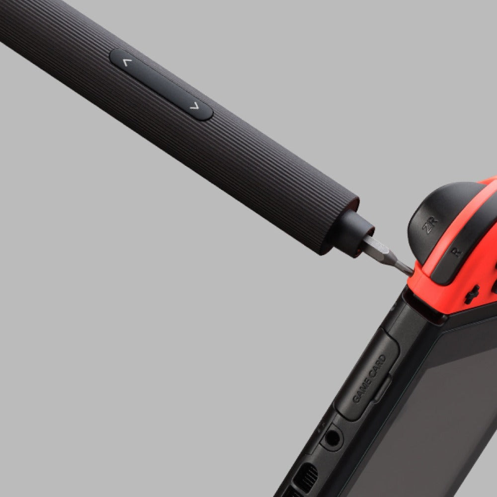 HOTO electric precision screwdriver on a games console