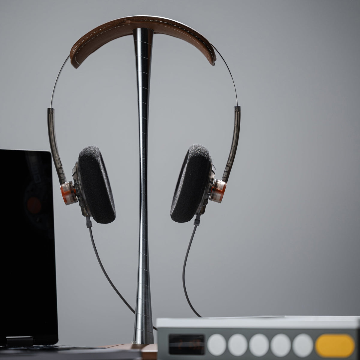MOONDROP Old Fashioned headphones on a stand