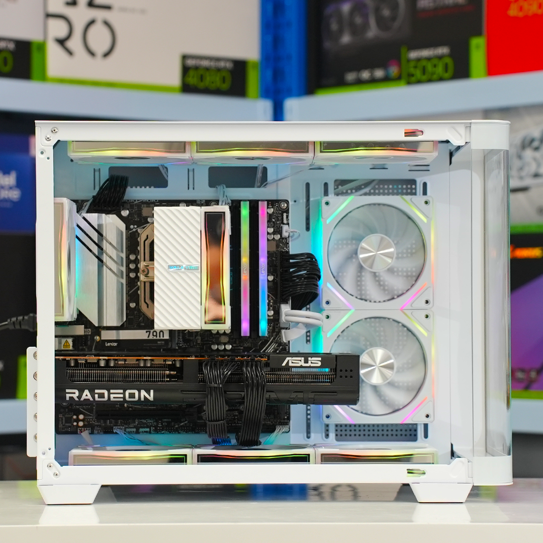 Delta Elite White gaming PC showcasing Ryzen 5 7500F and RX 9070XT with RGB lighting and tempered glass design.