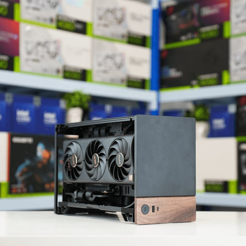 Compact workstation with a triple-fan graphics card and walnut base in the Radium shop
