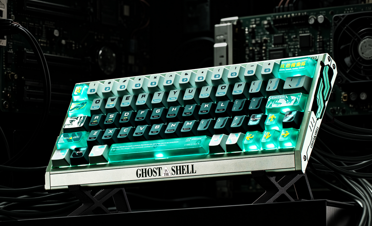 Shell Core edition at an angle, showing themed keycaps and accent plate