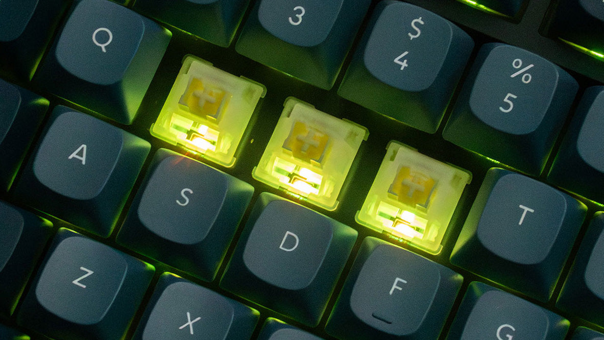 Keychron Silent Banana switches lit by a keyboard's backlight