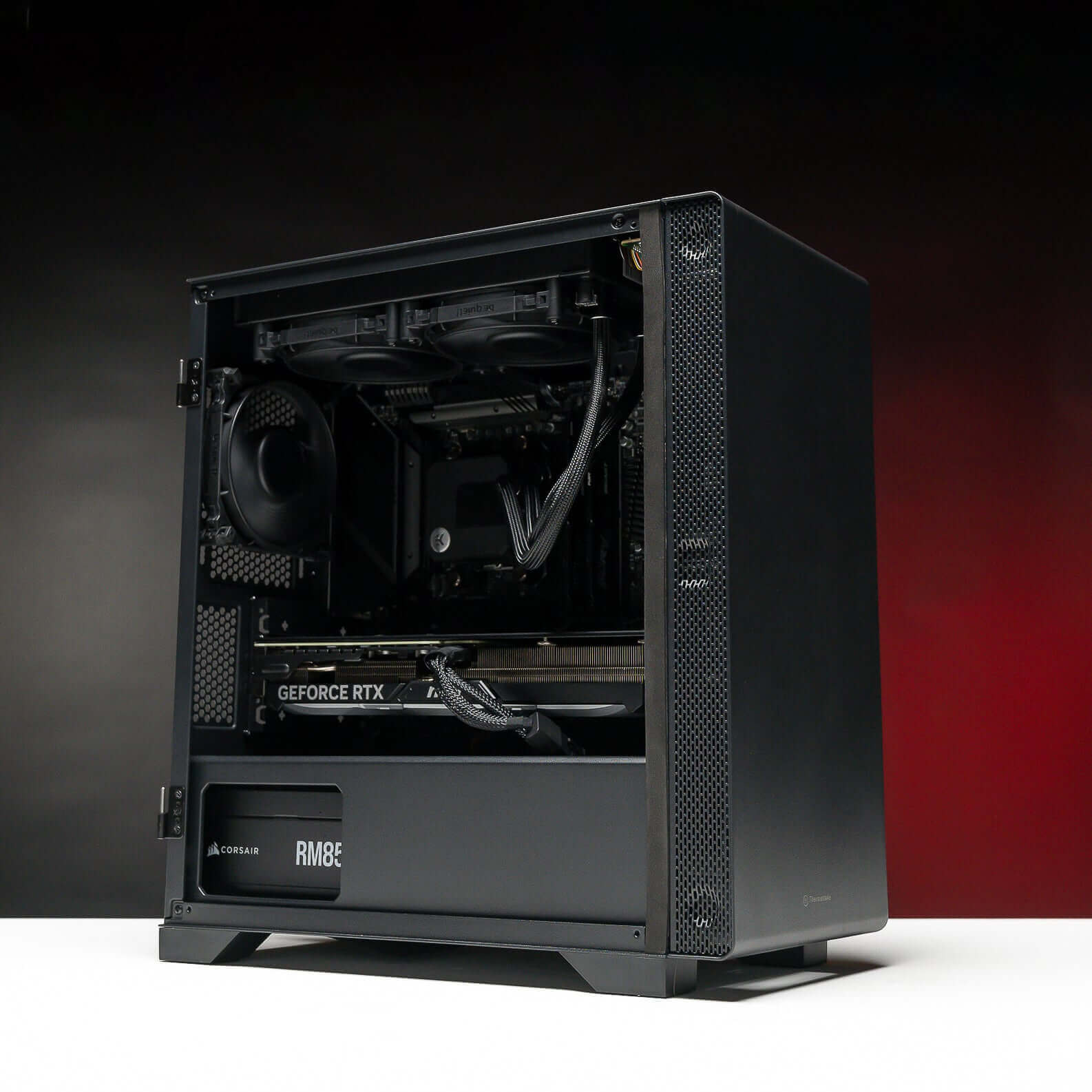 Side view of the sleek ECLIPSE Gaming PC showcasing the EKWB EK-AIO Basic All-In-One 240mm Liquid cooler and Corsair RM850e 850W 80+ Gold power supply
