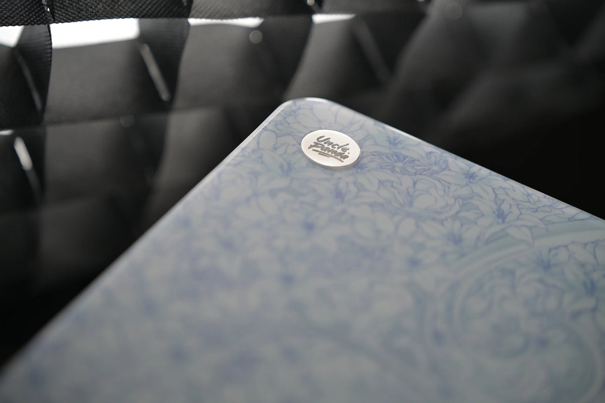Close-up of the P-LUCK V2's rounded corner and Uncle Panda badge