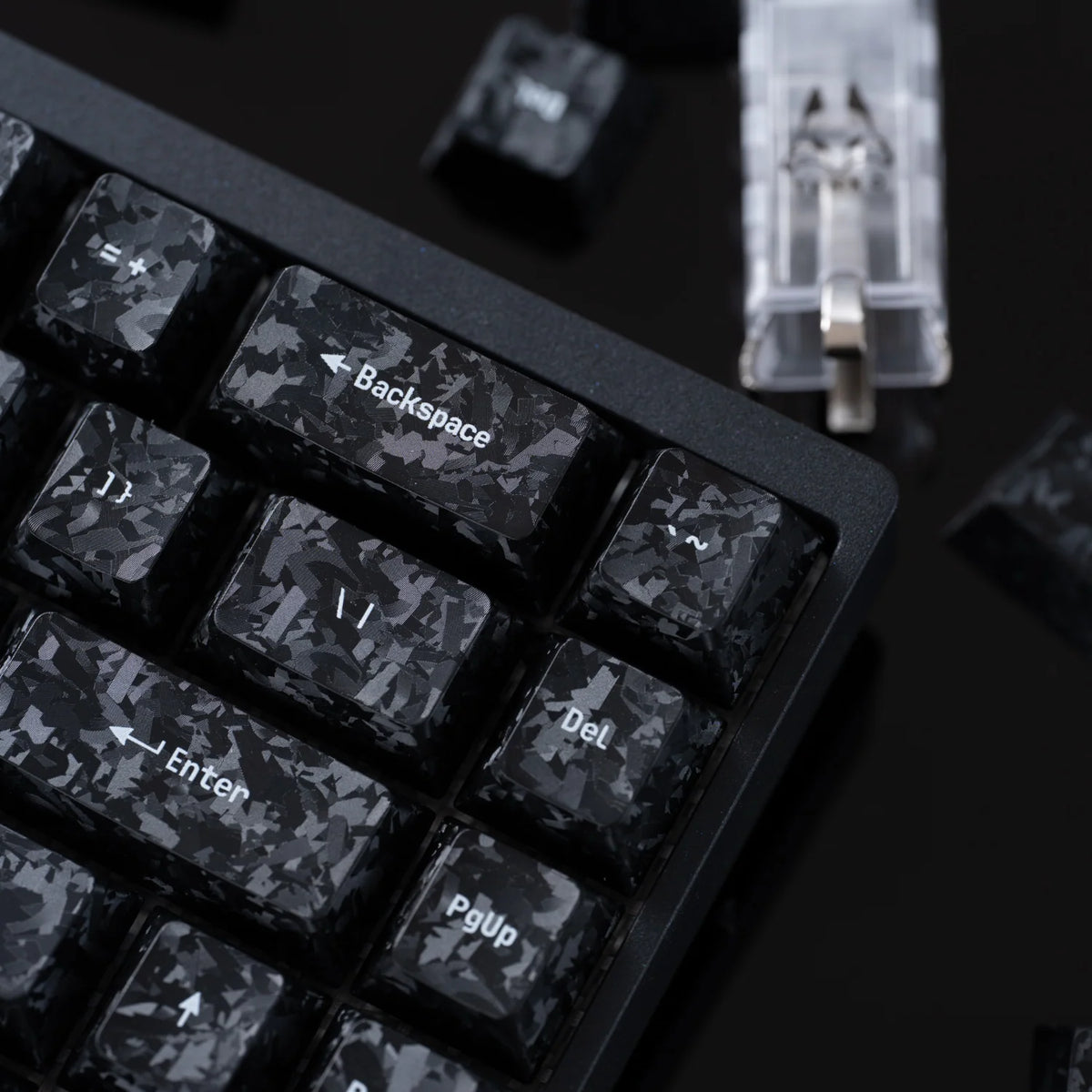 Close-up of the carbon fibre textured Backspace, Enter and Del keycaps